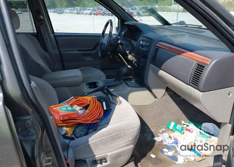 1999 Jeep Grand Cherokee Laredo z USA, uszkodzony, nr VIN 1J4GW58S2XC639287